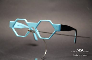 Monture bleu de forme hexagonale avec branches noires