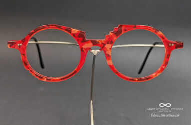 Monture artisanale forme ronde rouge écaille détail monture en acétate
